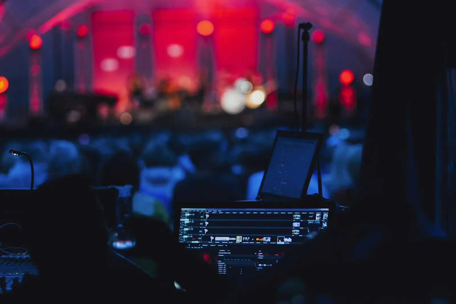 A front-of-house sound and lighting desk during a live event
